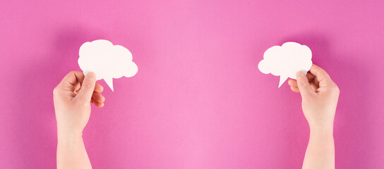 Holding a white cloud in the hand, empty copy space for text, pink background, communication and...