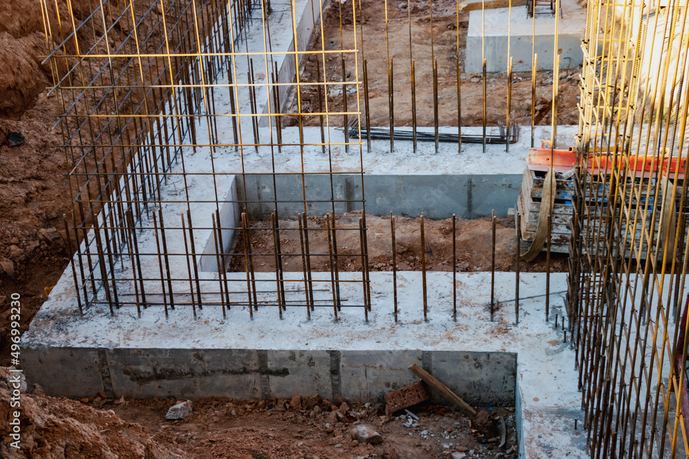 Poster monolithic foundation with metal reinforcement. forms vertical formwork structures for the basement 