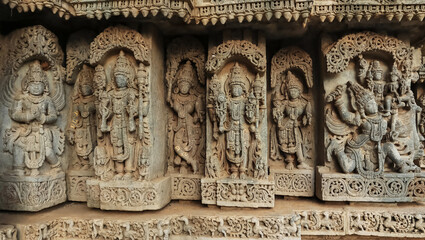 Sculptures of indian Gods Vishnu, Lord Varun, Hanuman on the wall of Lakshminarsimha Temple, Javagal , Hassan, Karnataka, India