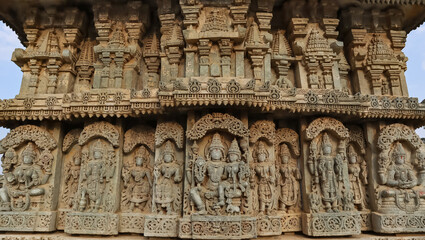 Naklejka premium Sculptures of indian Gods Vishnu, Lord Varun on the wall of Lakshminarsimha Temple, Javagal , Hassan, Karnataka, India