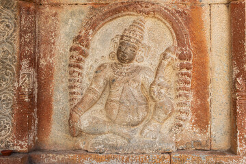 Fototapeta na wymiar Sculpture of Kuber on Lord Shiva Temple, Lakshmanlingeshwara Temple, Avani, Kolar, Karnataka, India