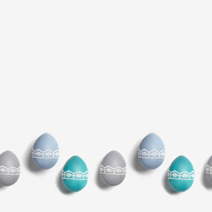 Easter eggs pastel colors green, blue, gray, beige on white background. Symbol Easter holiday, celebration food concept, dyed chicken egg trendy color and decorated lace tape. Top view