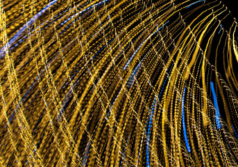 Festive lights in motion as an abstract background.