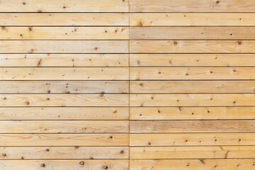 Background: slightly weathered horizontal softwood wall