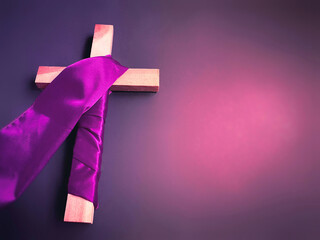 Lent Season,Holy Week and Good Friday concepts - religious cross in purple background. Stock photo.
