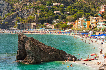 Fototapeta premium A Rock on Fegina Beach in Monterosso al Mare on a Summer Day