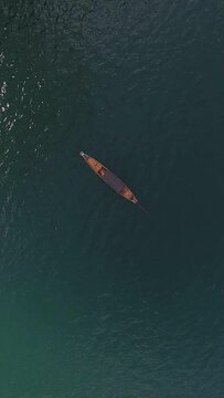 Man and woman relaxing in a boat