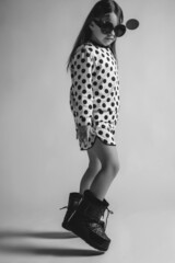 Beautiful and fashionable child girl. High quality photo