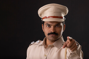 Close-up portrait of an angry Indian policeman