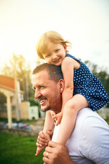 The love between a father and daughter is forever. Cropped shot of a father and his adorable daughter spending time together outside.