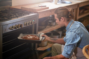 Life is what you bake it. Cropped shot of a man baking.
