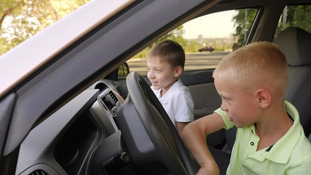Two boys are playing in the car while driving, they imagine themselves as adult drivers.