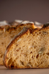A loaf of bread on the table, sliced bread. High quality photo