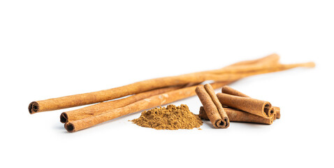 Dry cinnamon sticks and cinnamon powder isolated on white background. Cinnamon spice.
