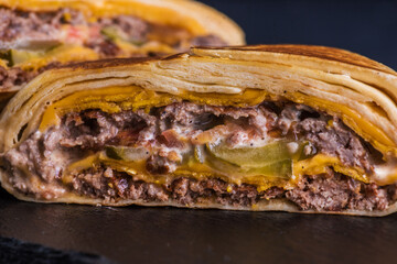 Quesadilla Country Beef. Tortilla, double beef patty, cheese, tomato, pickled cucumber