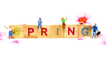 木製アルファベットブロックのSPRINGと人々