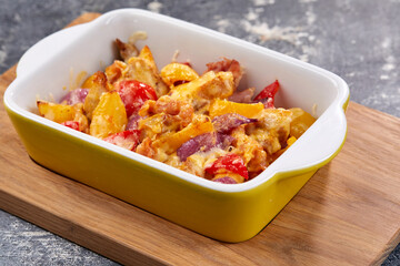 roasted vegetables with meat and cheese