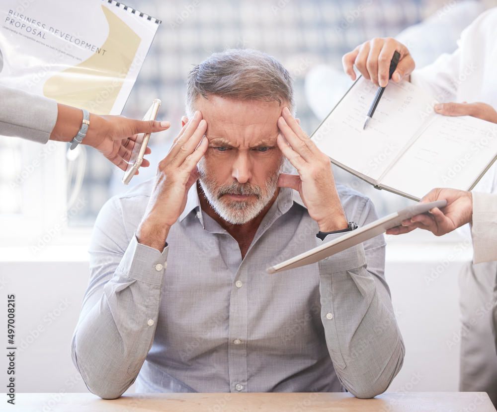 Poster its all just a little too much. cropped shot of a handsome mature businessman looking stressed while