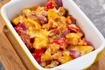roasted vegetables with meat and cheese
