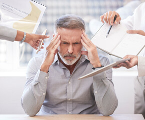 Its all just a little too much. Cropped shot of a handsome mature businessman looking stressed...