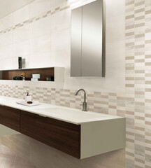 Modern interior design of bathroom with elegant tiles, seamless bathroom vanity, luxurious interior background.