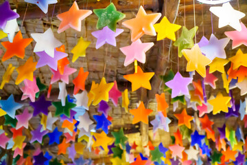 Multicolored candles cast in the shape of a star.