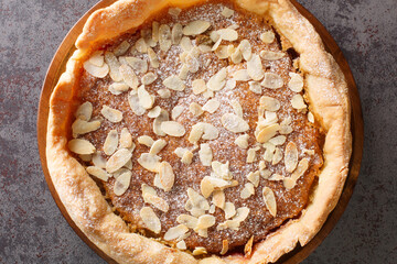 English traditional dessert Bakewell Pudding cake close-up on the table. horizontal top view from  above