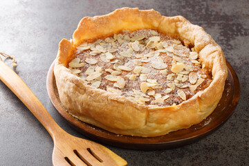 English traditional dessert Bakewell Pudding cake close-up on the table. horizontal
