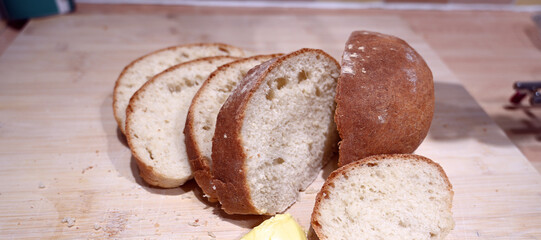 fresh cooked white bread, sliced loaf ready for sandwiches or side on a meal, sustainable world food