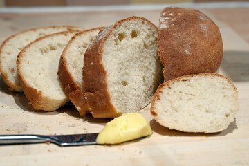 fresh cooked white bread, sliced loaf ready for sandwiches or side on a meal, sustainable world food