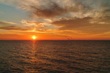 
View from sunrise or sunset
Zaporozhye nuclear power plant in Energodar, Ukraine, close-up from the embankment of Nikopol