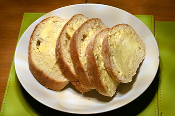 fresh cooked white bread, sliced loaf ready for sandwiches or side on a meal, sustainable world food