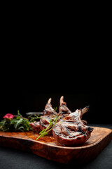 Rack of lamb with sauce and herbs