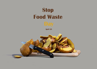 Concept of Stop food waste day. Potato peels are one of the most commonly discarded items during food prep.