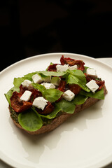 Bruschetta with Tomato, cheese and herbs