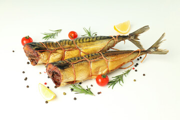 Concept of tasty food with smoked mackerel on white background