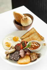 traditional full english breakfast in london UK restaurant - 497015409