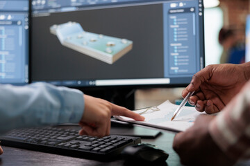 Close up of creative industry employees with clipboard and advanced 3D modeling software open in background. 3D digital artists reviewing sketch scene plan and simulated render times, - obrazy, fototapety, plakaty