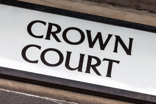 Crown court sign close up which is part of the legal system in the UK for trial by jury, stock photo image
