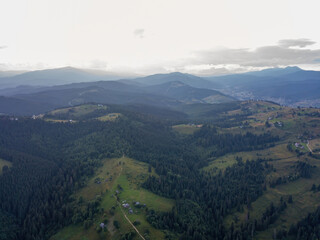 Obraz premium Sunset over the mountains in the Ukrainian Carpathians. Evening. Aerial drone view.