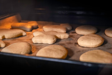 ginger cookies in the oven, the process of making cookies