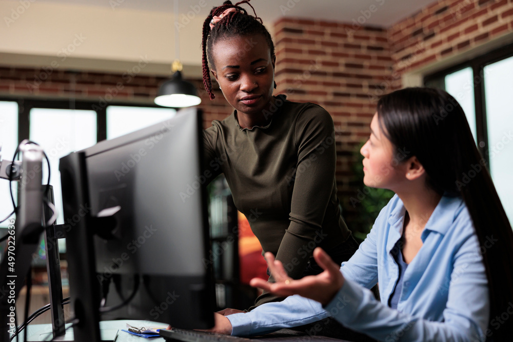 Poster doubtful woman discussing with production department team leader about digital design flaws. creativ