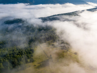 Foggy summer morning in the Ukrainian Carpathians. Aerial drone view.