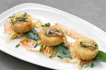 traditional thai crab cakes with chilli sauce in bangkok restaurant
