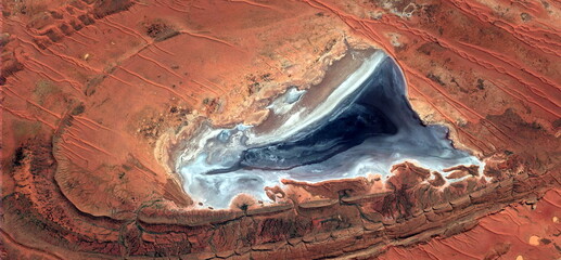 abstract landscape of the deserts of Africa from the air emulating the shapes and colors of a...