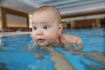 Fototapeta na wymiar baby swimming