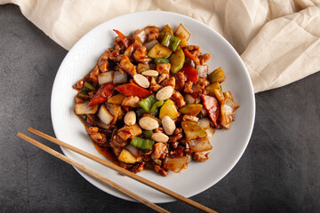Oriental chicken with almonds. Typical chinese food