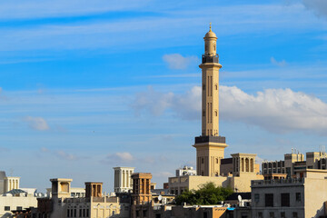 Fototapeta na wymiar Mosque's minaret in Dubai old town. Heritage architecture.