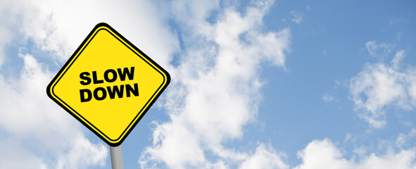 slow down sign on white background	