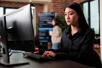 Cyber officer working with binary numbers for database application development through neural...